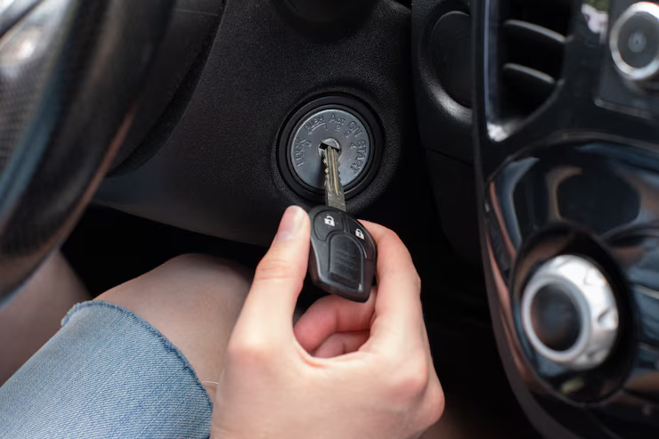 A car key rests on the dashboard, highlighting the theme of vehicle key replacement.